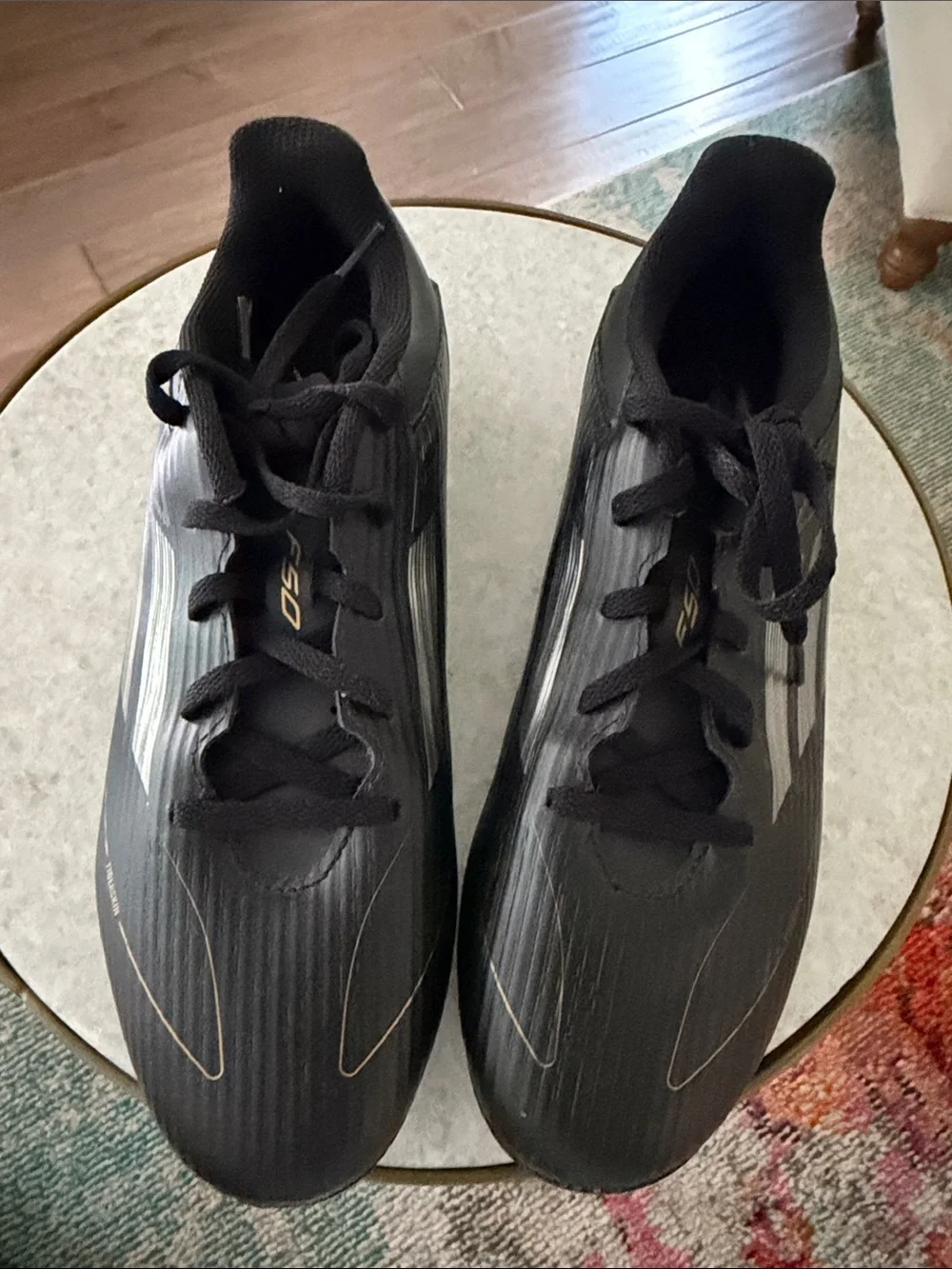 adidas Men’s Black Soccer Cleats with Silver Stripes